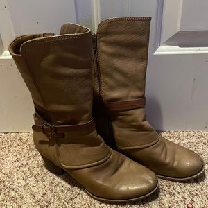 Brown boots with heels.